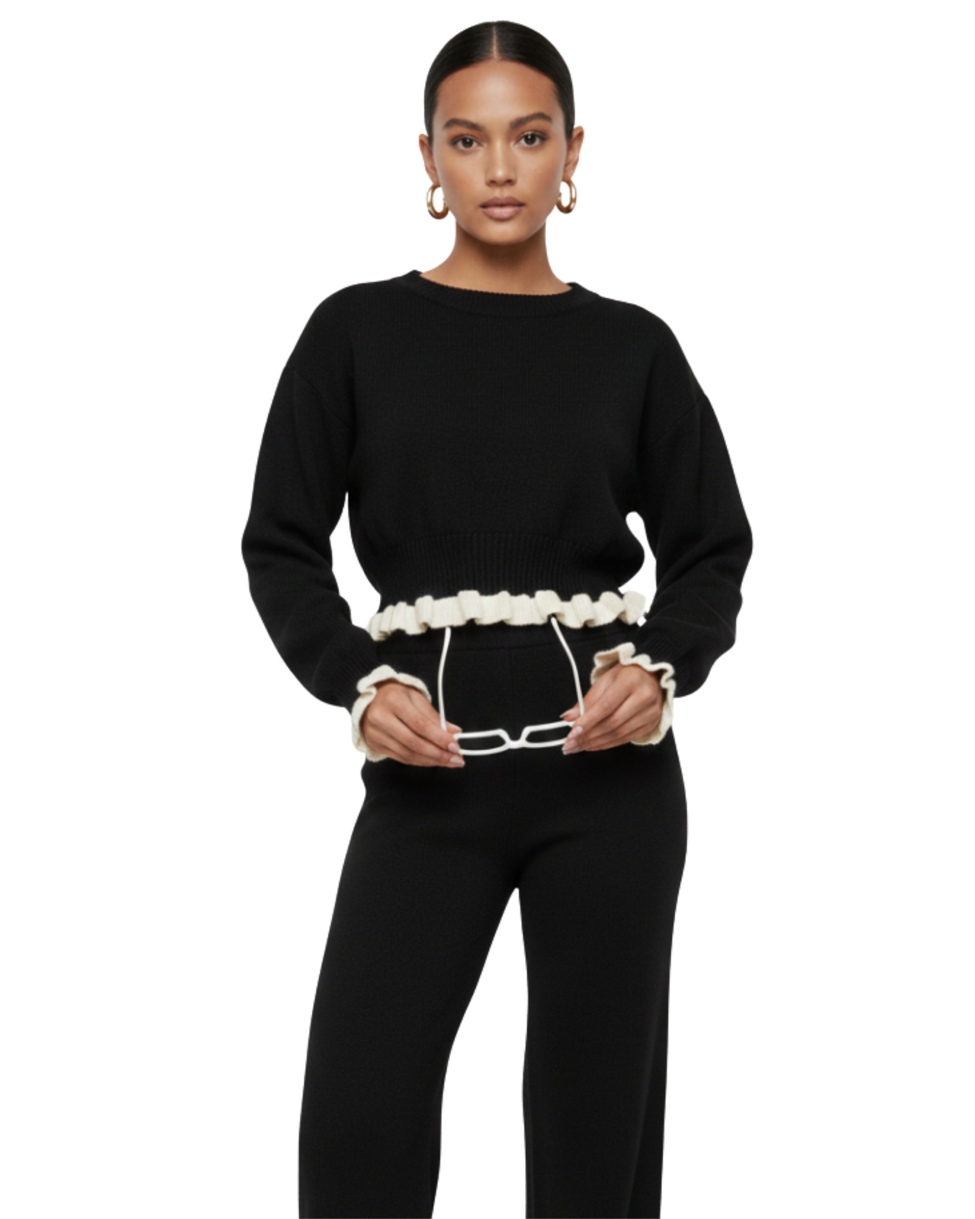 Simplitate și rafinament într-un singur set. Acest compleu negru din tricot reiat este definiția confortului modern.